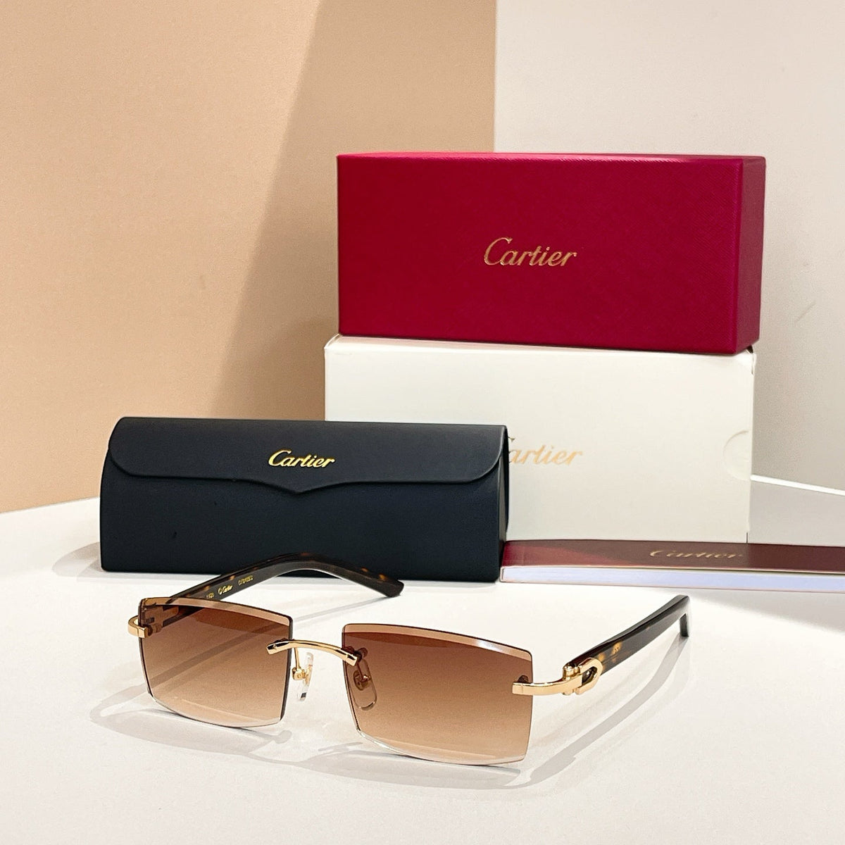 CARTIER C DE RIMLESS RECTANGULAR FRAME SUNGLASSES  571828 IN METAL